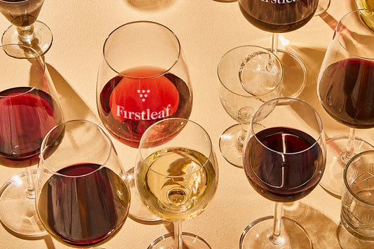 Glasses of red and white Firstleaf wine.