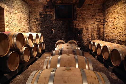 Oak barrels in a wine cellar