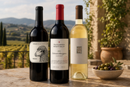 California Dreaming 3 bottle wine collection on a stone table in a california vineyard