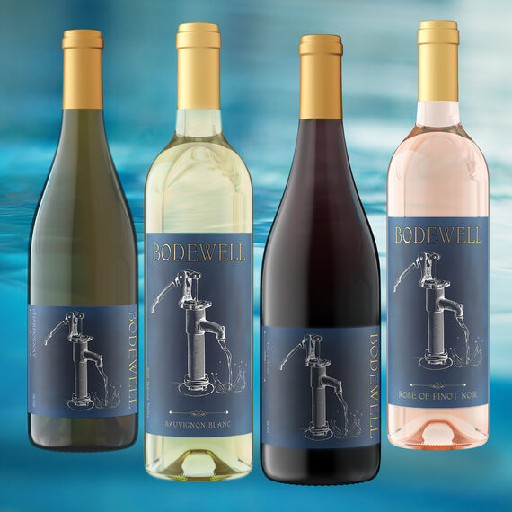 Four bottles of different colored Bodewell wine 