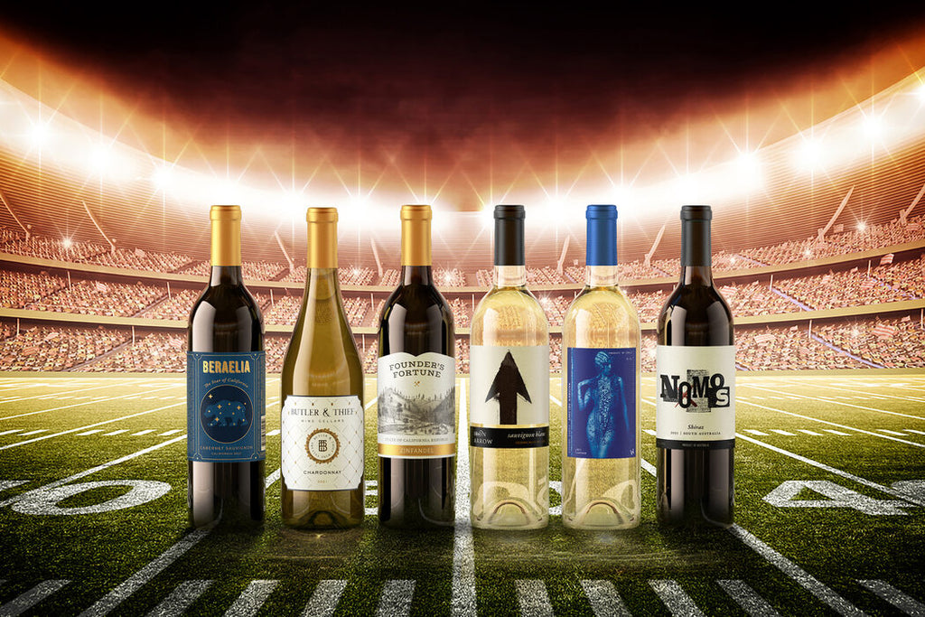 6 bottles of wine on the field of a football stadium
